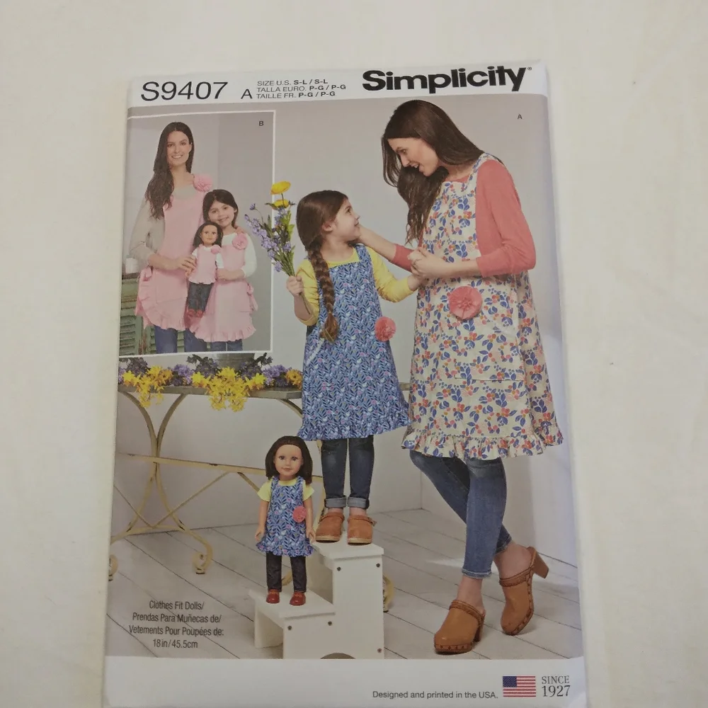 Simplicity S9407 Cute Aprons in adult child & American Girl Doll sizes.